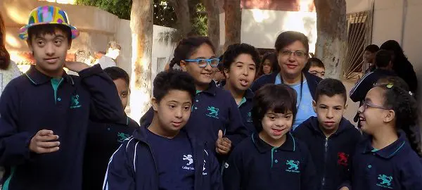 A group of children wearing the same jackets